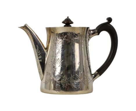 A silver teapot with leaf decoration - with ebonised handle and finial, London 1875, Robert Garrard II, height 17cm, weight 7