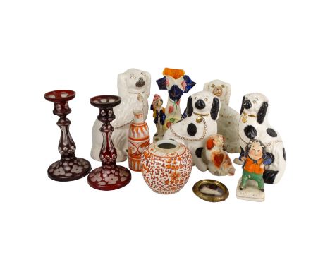 A pair of late 19th century Staffordshire dogs - black spots with gilt collar and chains, 23cm high, together with three othe