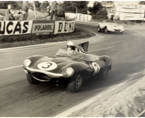 Seven framed and signed Edward Eves motor racing photographs,each monochrome, depicting late 1950s motor racing scenes and co