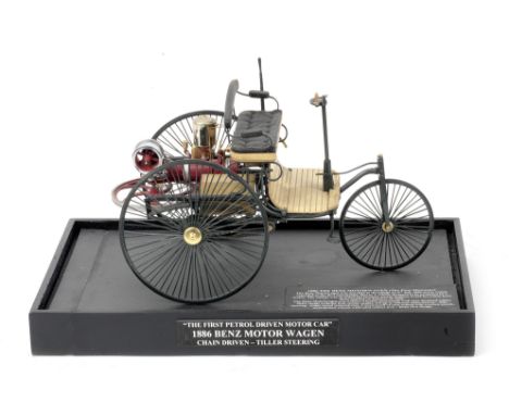 A 1:8 scale model of the 1886 Benz Motorwagen,metal and plastic construction, depicting the 'First Petrol Driven Motor Car' t
