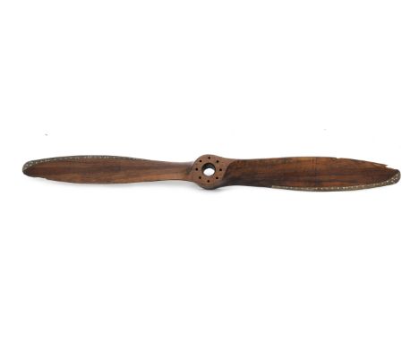 A twin bladed wooden propeller from a circa 1928 de Havilland Puss Moth DH.80A, believed used by Jim Mollison,laminated hardw