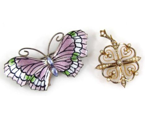 An Edwardian flowerhead drop brooch, partially pierced and set with pearls fronting a plain pin back, yellow metal marked, 9c
