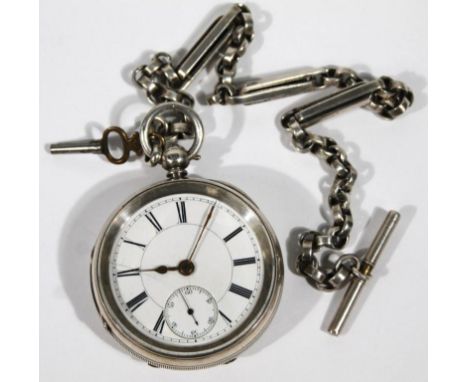 A Victorian silver open faced pocket watch, the 5cm dia. Roman numeric dial with Arabic subsidiary second hand, in a part eng