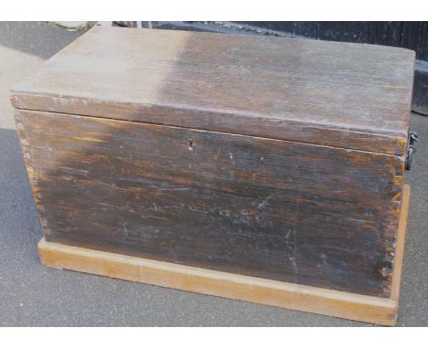 A 19thC stained oak and pine tool chest, of rectangular outline, the hinged lid revealing a plain interior with visible dove 