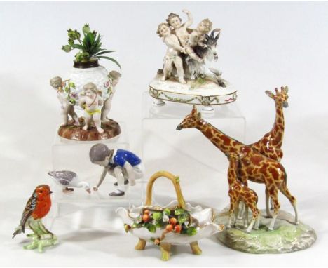 Various Continental porcelain, semi porcelain figure groups to include a Meissen style cherub planter, 20cm high, a Royal Cop