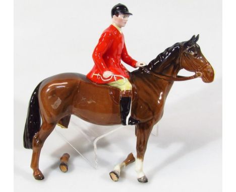 A Beswick red jacketed huntsman on brown horse, printed marks beneath, 22cm high. (AF)