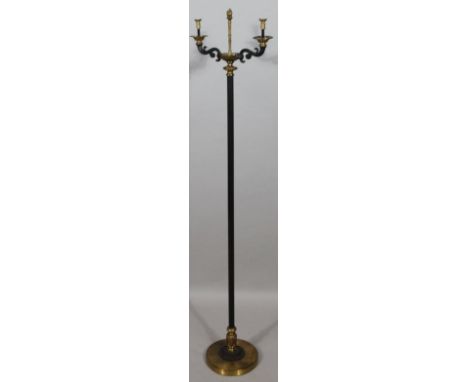 A Regency style torchere stand, with flame finial flanked by double S scroll dish holders on cylindrical stem and gilt metal 