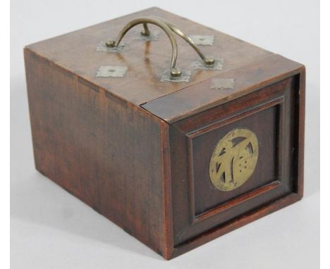 A 20thC hardwood oriental design jewellery/magic box, with metal mounts and swing handles, the lift-up front hinging to revea