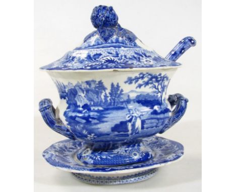 An early to mid 19thC blue and white Pearlware sauce tureen, stand and ladle by Brameld, decorated with various figures in sc