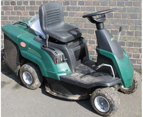 An Atco ride on lawn mower, with Briggs and Stratton engine, 62cm wide.