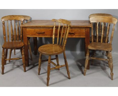 A 19thC pine kitchen table, with two frieze drawers on square tapering supports and plank top, 76cm high, 120cm wide, 75cm de