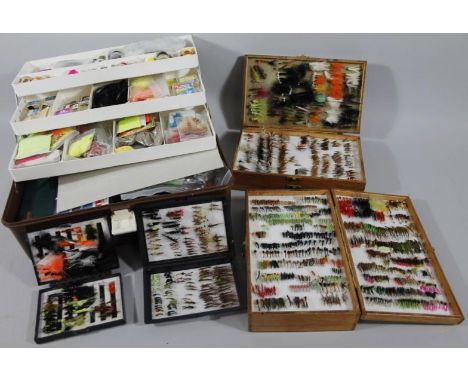 Two double side cases of tied fishing flies, two pocket cases and a case of tie equipment. (5)