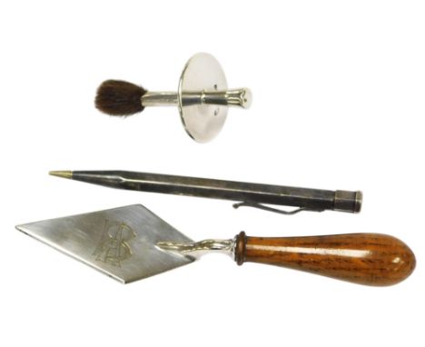 A silver presentation trowel, with a turned wooden handle, monogram engraved, Sheffield, hallmarks worn, together with an Edw