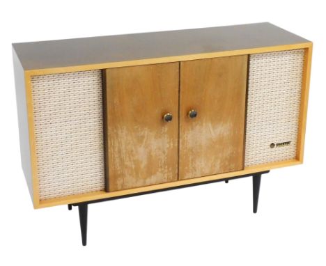 A mid century teak cased Pye radiogram, with a record player and stereo speakers, 83cm high, 123cm wide, 40cm deep, together 