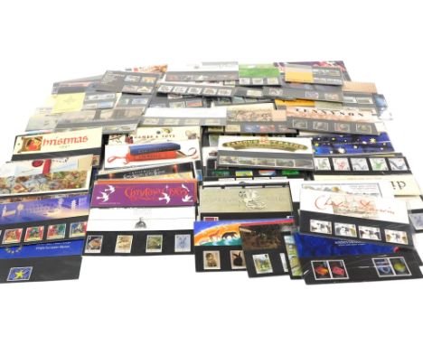 Philately. GB post decimalisation mint commemorative stamps, in presentation packs. (a quantity)
