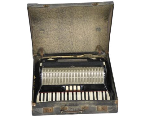 An Orfeo piano accordion, in a black casing, 120 button, cased.