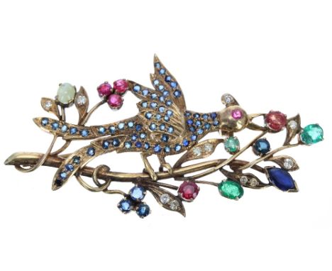 Attractive yellow gold multi gem set brooch, fashioned with an exotic bird amidst a floral surround set with diamonds, sapphi
