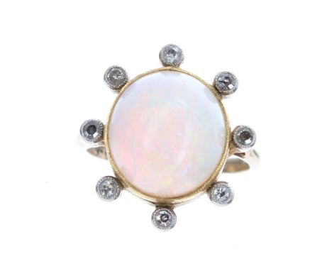 Large cabouchon opal and diamond dress ring, the opal surrounded by eight small diamonds, 9ct , the opal 13mm x 12mm, 4.6gm, 