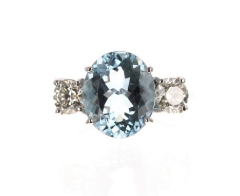 Fine platinum aquamarine and diamond three stone ring, the aquamarine estimated 4.00ct approx, with two round brilliant-cut d