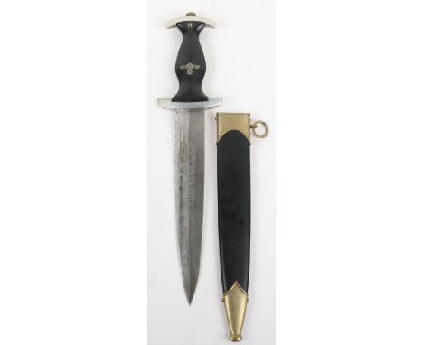 Third Reich SS Enlisted Mans Dress Dagger, with blackened grip having enamel SS rune emblem and eagle inserted. Housed in a b