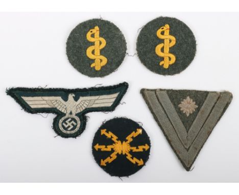 WW2 German Army Uniform Cloth Insignia Grouping, consisting of bevo M-36 combat tunic eagle (uniform removed), rank chevron a