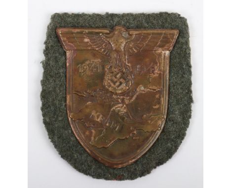 WW2 German Army / Waffen-SS Krim Campaign Shield, good example with the original cloth uniform backing and the paper backing 