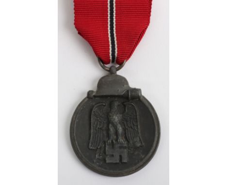 WW2 German Eastern Front Medal by Gustav Brehmer, good zinc example with its original ribbon and the ring is stamped with num
