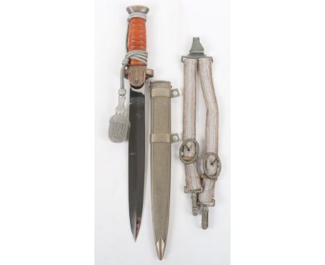 Third Reich Red Cross (Deutsche Rotes Kreuz) Officers Dress Dagger, with deep orange celluloid grip, cross guard with red cro