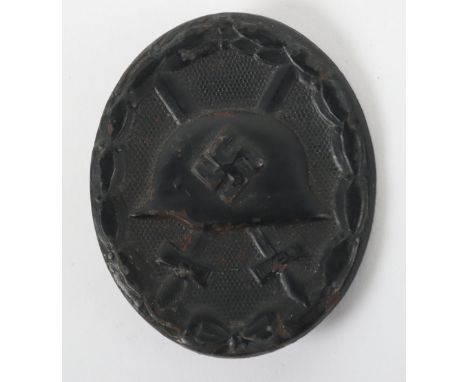 WW2 German Black Grade Wound Badge by Friedrich Orth Wien (L/14), much of the original black finish remains to the award. Com