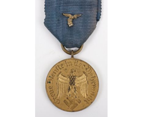 WW2 German Luftwaffe 12 Year Long Service Medal, fine example with blue ribbon having gilt Luftwaffe droop tail eagle emblem 