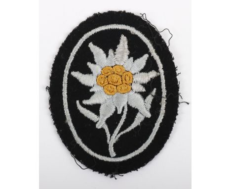 WW2 Waffen-SS Mountain Troops Arm Badge, good un-issued example of the Dachau made arm badge for the mountain troops of the W