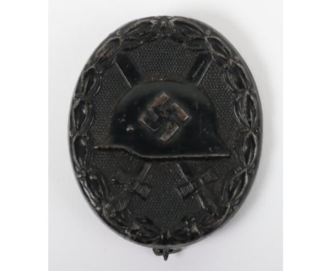 WW2 German Black Grade Wound Badge by Gustav Brehmer, much of the original black finish remains to the award. Complete with p
