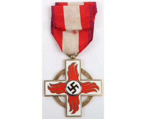 Third Reich Fire Brigade Decoration in Gold, good example with perfect undamaged enamel. Complete with ribbon. Un-marked exam