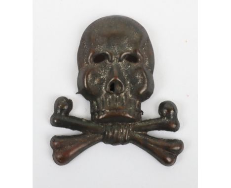 WW2 German Infantry Regiment Nr17 Skull Tradition Cap Insignia, with pin fitting to the reverse, one missing. This item was b