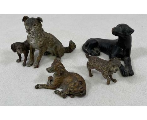 Three Austrian cold painted bronze models of dogs, circa 1900, the larger example with two dogs, height 10.5cm, also a painte