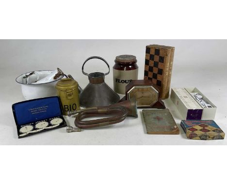 A group of collectors' items including a mantel clock, board games, enamelware, copper and brass items including a bugle, (ch