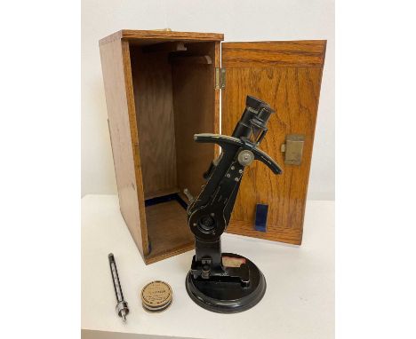 BELLINGHAM &amp; STANLEY; an oak boxed microscope, height 37 cm, together with a thermometer and a boxed glass test piece.