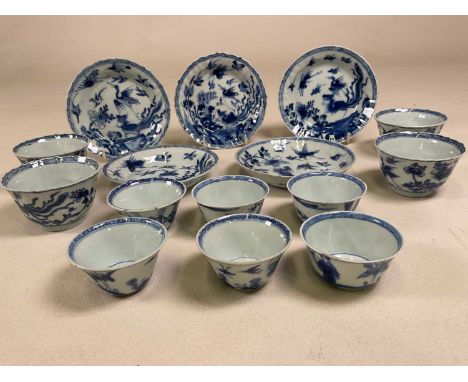 A group of 19th century Chinese tea bowls and saucers, one of the saucers with painted character marks, some small losses.Con