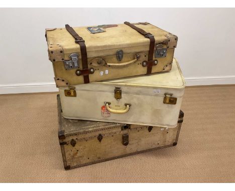 An early 20th century vellum travel case with leather straps, height 24cm, width 76cm, depth 47cm, a mid 20th century vellum 