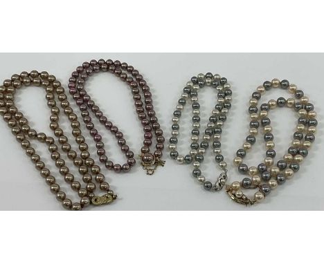 MAJORICA PEARLS; a cultured pearl two tone necklace with silver gilt clasp, boxed with certificate and a cultured pearl neckl