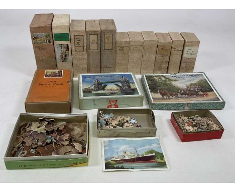 A collection of vintage jigsaw puzzles in mainly book style boxes, includes GWR puzzle of Bath by Chad Valley and others.Cond
