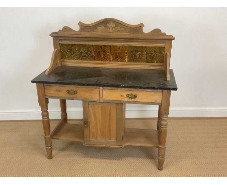 An early 20th century pine tile back marble top wash stand, with Art Nouveau tiles, height at the back 114cm, width 108cm, de