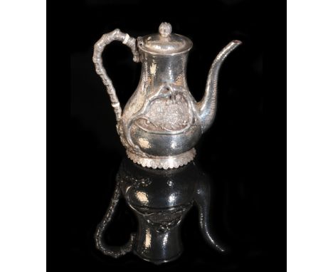 A CHINESE EXPORT SILVER COFFEE POT impressed marks to the underside for makers Jiu Jiang and Tu Mao Xing, one side decorated 