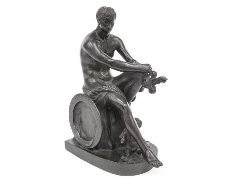 A classical bronze study of the Ludovisi Ares/Mars, early 19th Century, modelled seated on a stump holding a sword and shield