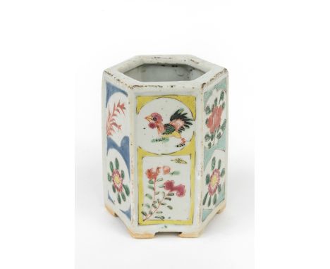 A Chinese famille rose enamelled hexagonal brush pot, late Qianlong period, each facet painted with an upper and lower panel 