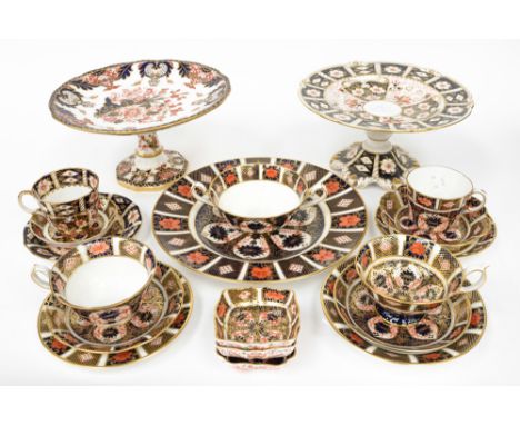 A collection of Royal Crown Derby Old Imari 1128 pattern plates and tea ware including dinner plate, saucers, comports, dishe