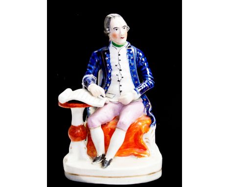 A 19th century Staffordshire figure of Captain James Cook, circa 1845, modelled in seated pose, in blue jacket, after the por