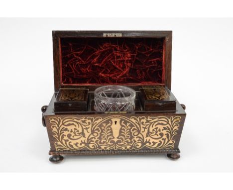 An early 19th Century brass inlaid rosewood tea caddy, T Dalton, manufacturer, sarcophagus form with gadrooning to the border