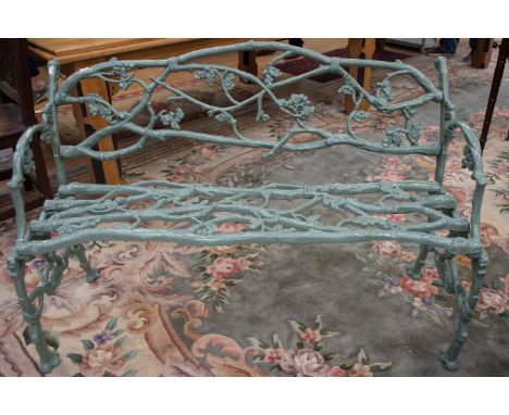 A late 19th century cast iron garden bench, attributable to Coalbrookdale, in a naturalistic form, with an iron seat, 85cm hi