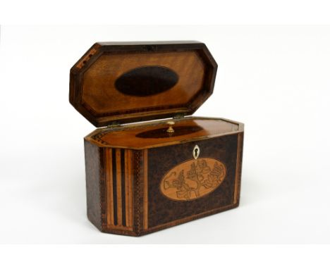 A George III style burr walnut and inlaid tea caddy, the hinged octagonal cover inlaid with an oval satinwood and yew medalli